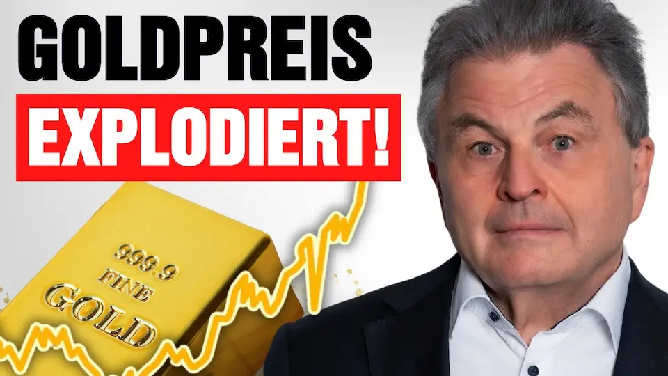 Man with gold bar and price chart